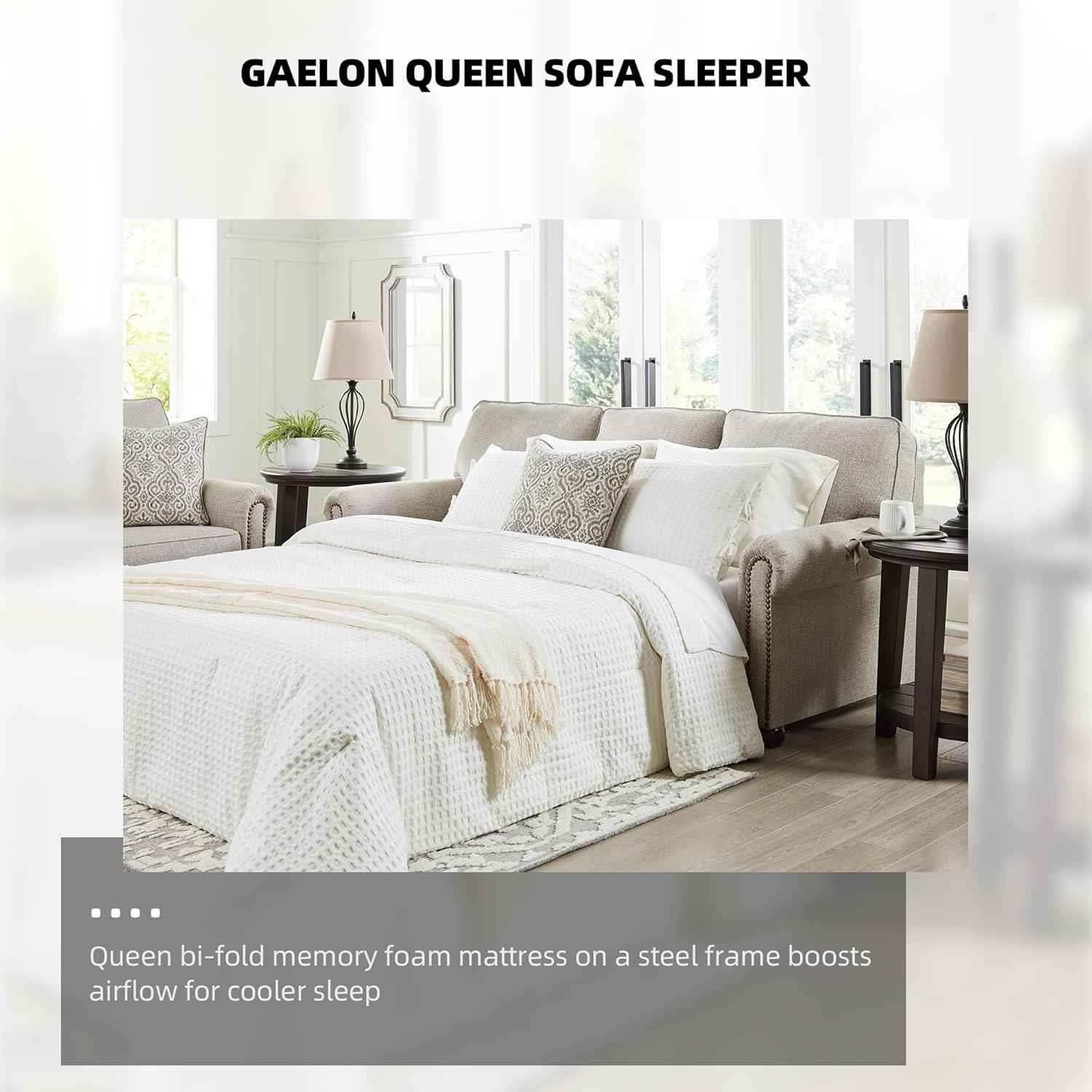 imageSignature Design by Ashley Gaelon Transitional 2in1 Sofa Sleeper with Folding Gel Memory Foam Mattress Nailheads and 2 Accent Pillows Queen BeigeQueen Sofa Sleeper