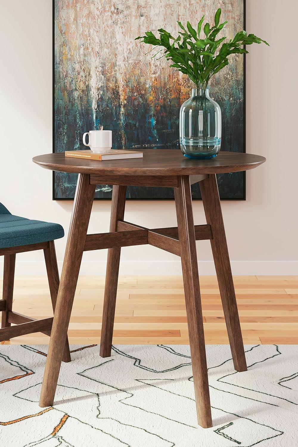imageSignature Design by Ashley Neymorton Modern Counter Height Dining Table with Trestle Base Dark BrownCircle