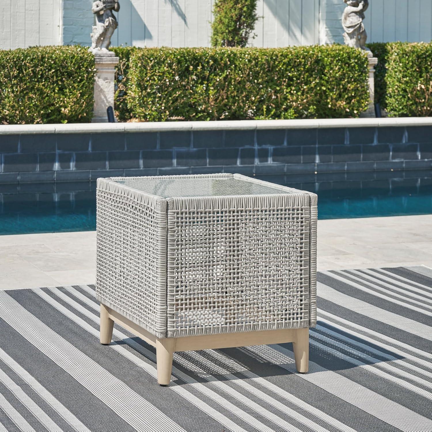 imageSignature Design by Ashley Seton Creek Contemporary Chic Outdoor AllWeather Resin Wicker End Table with Tempered Glass Tabletop Gray ampamp Light BrownOutdoor End Table