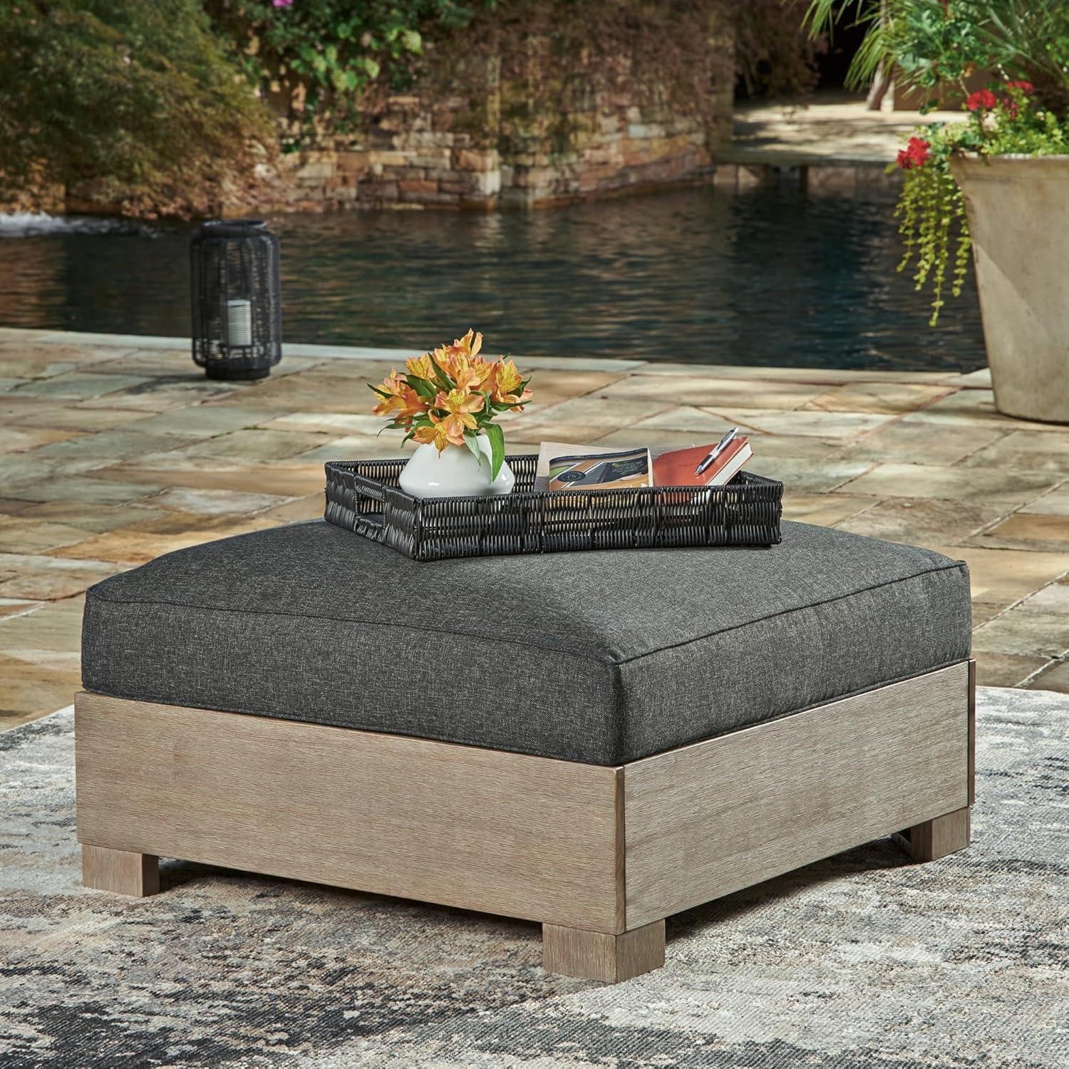 imageSignature Design by Ashley Citrine Park Casual Outdoor Ottoman with Cushion Nuvella Weather Resistant Fabric Light Brown ampamp Gray