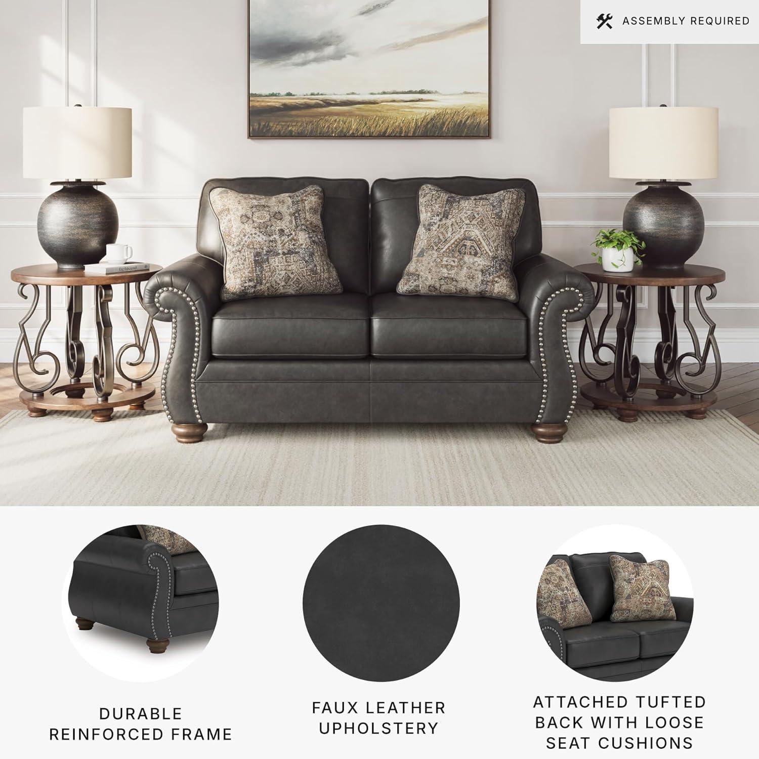 imageSignature Design by Ashley Chatterton Rustic Faux Leather Loveseat with Nailhead Trim and 2 Throw Pillows Reinforced Frame for Added Stability Reversible Seat Cushions Turned Legs BlackBlack