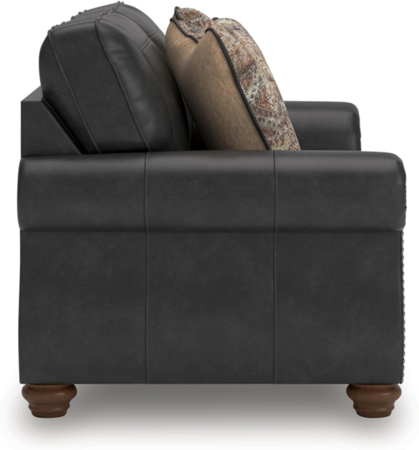 imageSignature Design by Ashley Chatterton Rustic Faux Leather Loveseat with Nailhead Trim and 2 Throw Pillows Reinforced Frame for Added Stability Reversible Seat Cushions Turned Legs BlackBlack