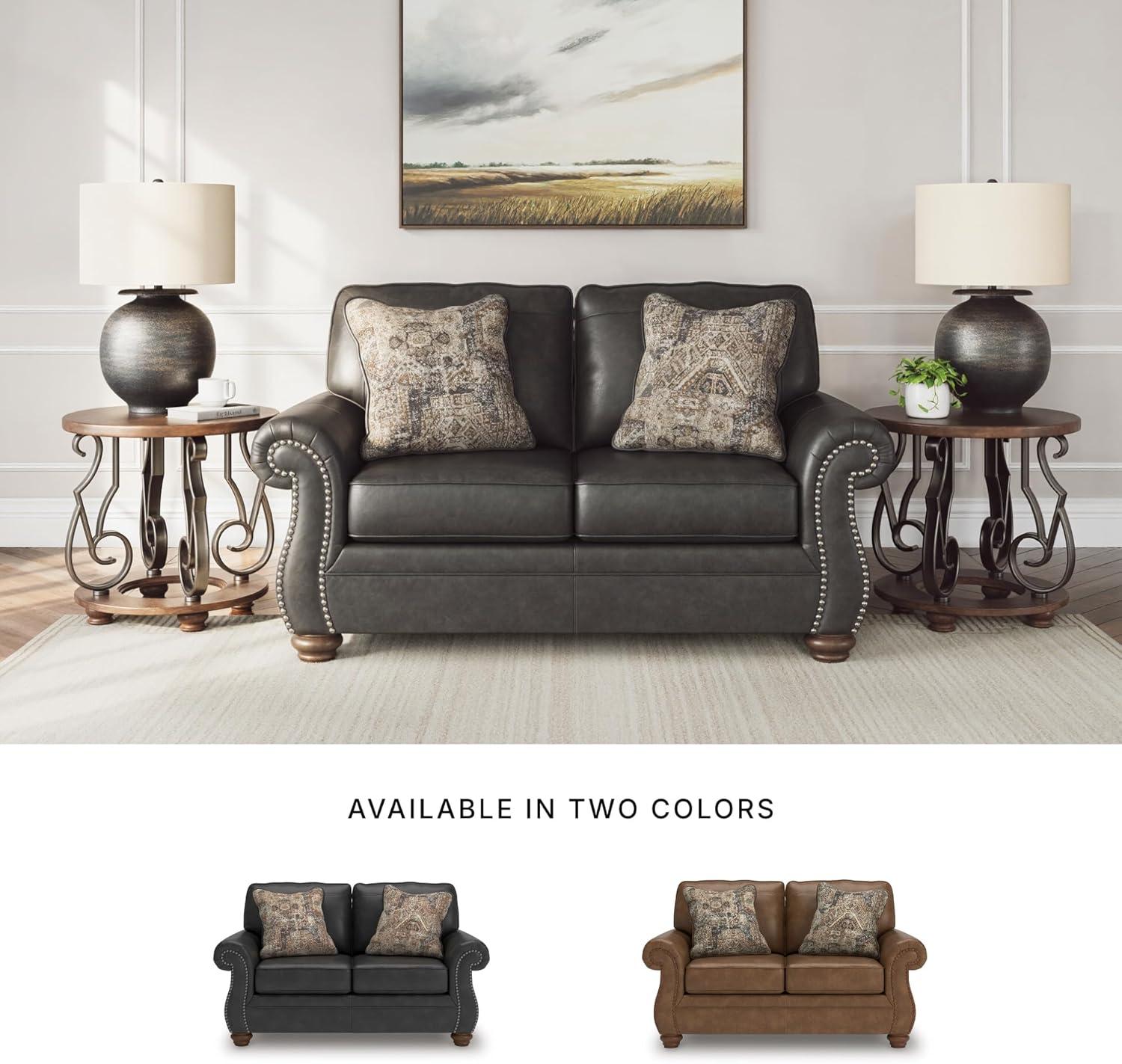 imageSignature Design by Ashley Chatterton Rustic Faux Leather Loveseat with Nailhead Trim and 2 Throw Pillows Reinforced Frame for Added Stability Reversible Seat Cushions Turned Legs BlackBlack