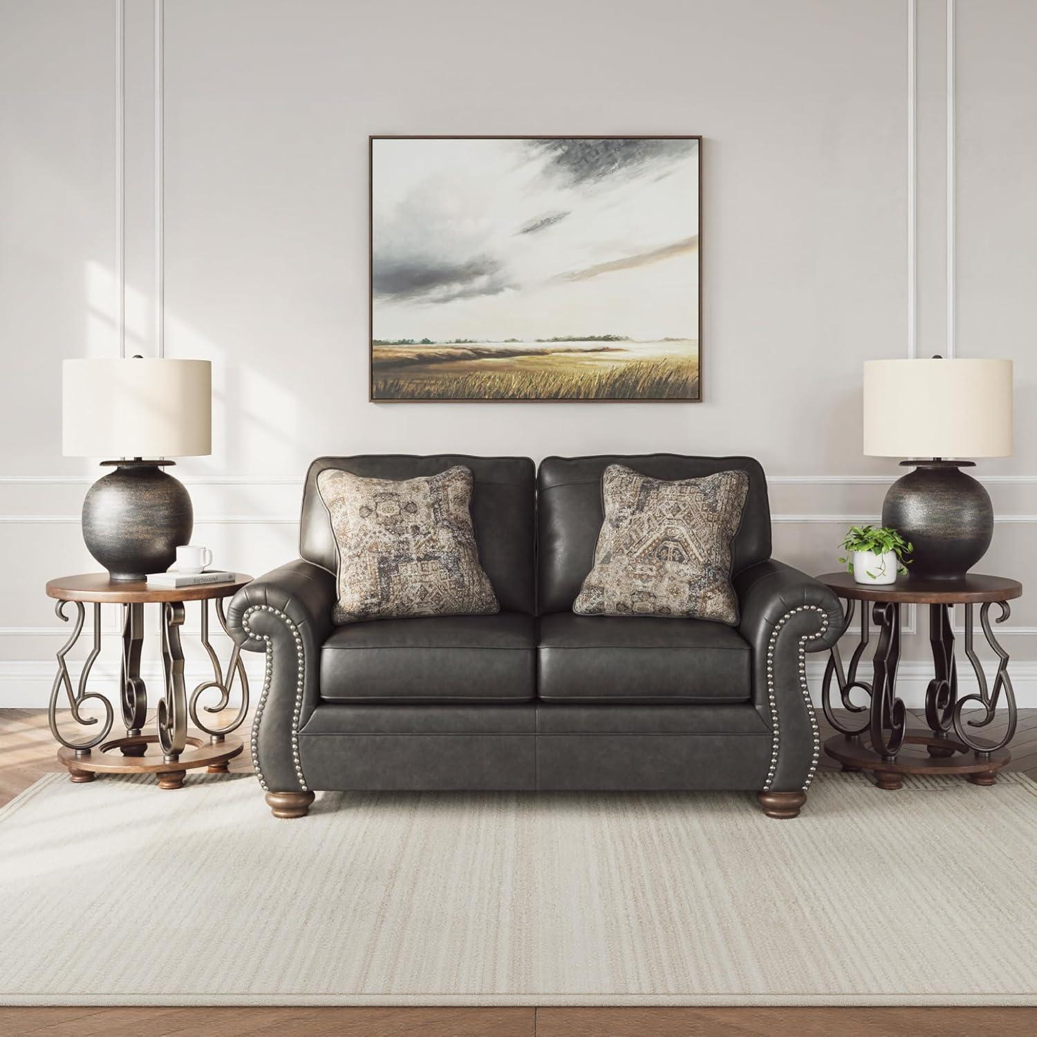 imageSignature Design by Ashley Chatterton Rustic Faux Leather Loveseat with Nailhead Trim and 2 Throw Pillows Reinforced Frame for Added Stability Reversible Seat Cushions Turned Legs BlackBlack