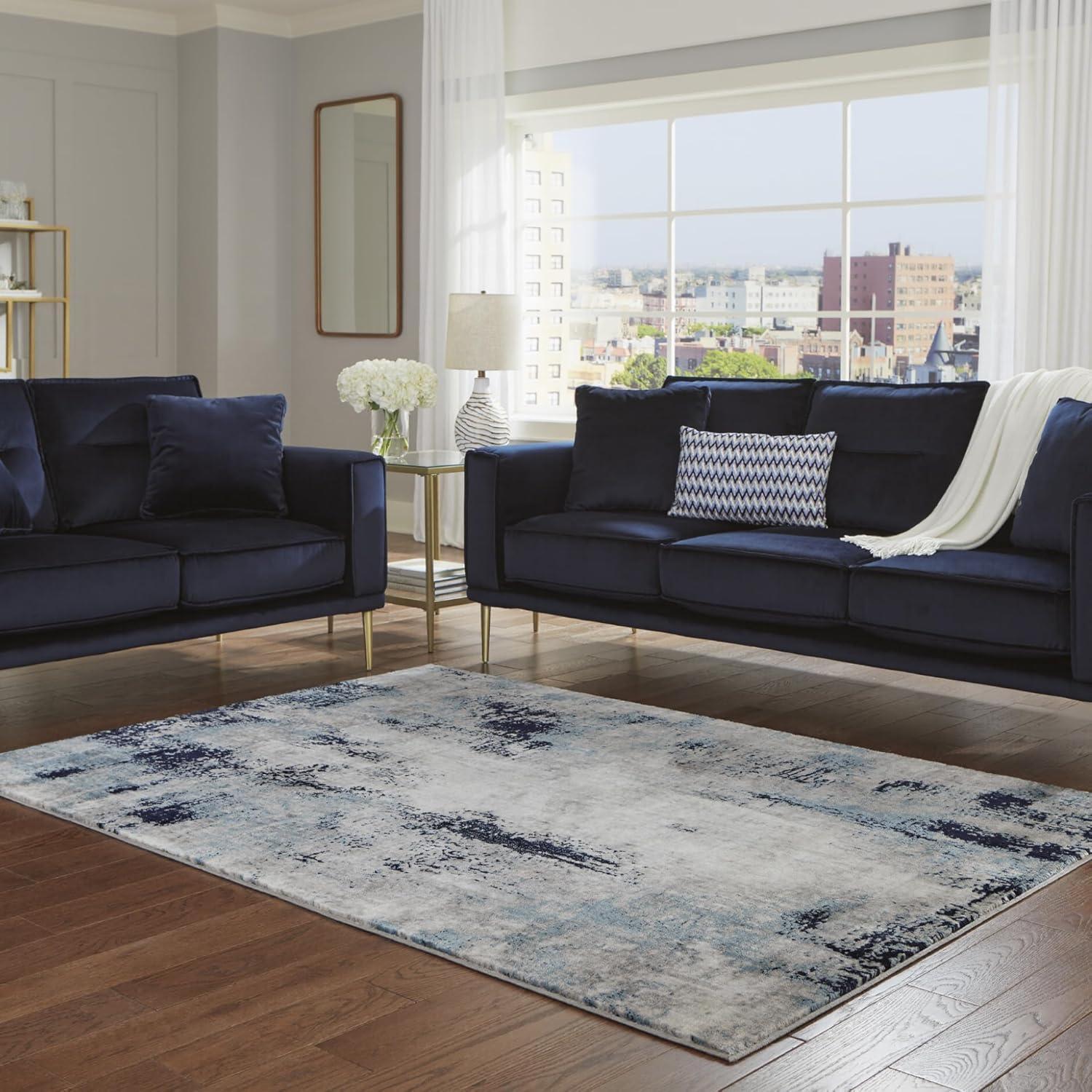 imageSignature Design by Ashley Leonelle Contemporary 5 x 7 Medium Pile Abstract Design Rug Cream Blue ampamp Gray710 x 10 Rectangular