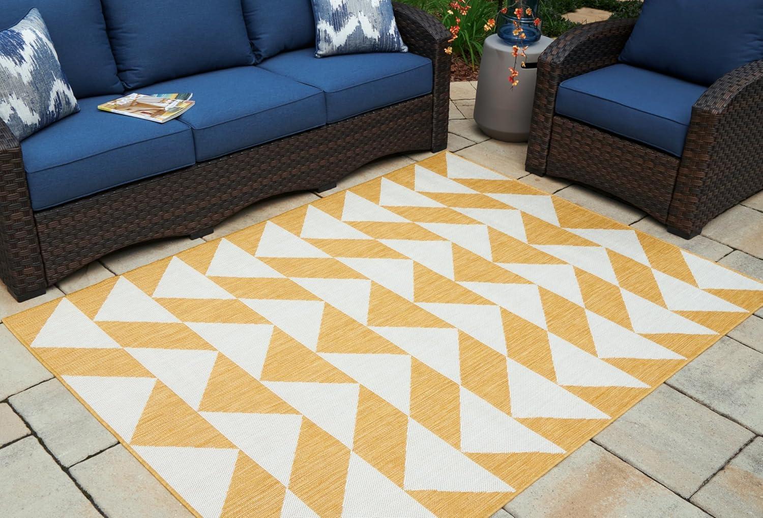 imageSignature Design by Ashley Thomley Casual IndoorOutdoor Geometric 5 x 7 Rug with Non Slip Backing Yellow ampamp White79 x 911 Rectangular