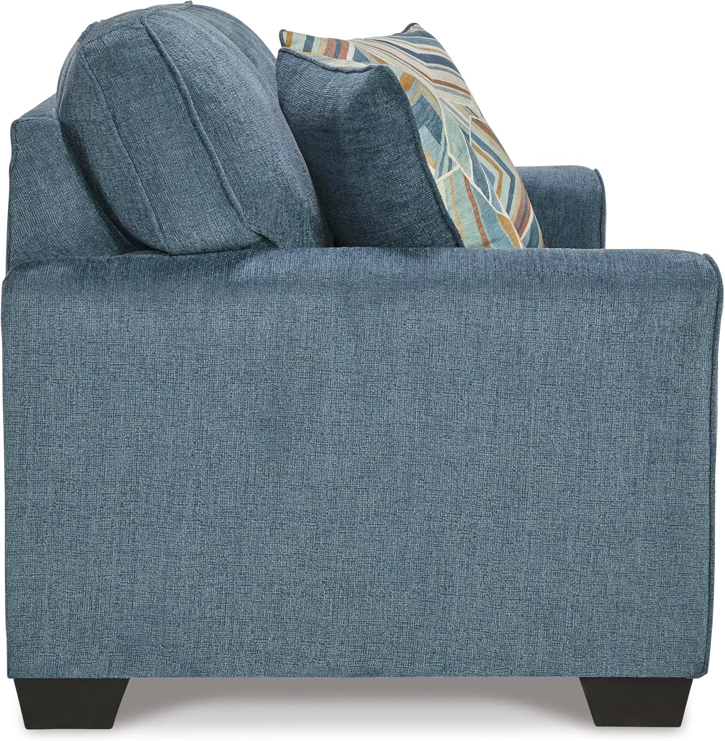 imageSignature Design by Ashley Cashton Contemporary Loveseat Exposed Feed With Faux Wood Finish Accent Pillows Fabric Upholstery 63quot W x 38quot D x 39quot H BlueBlue
