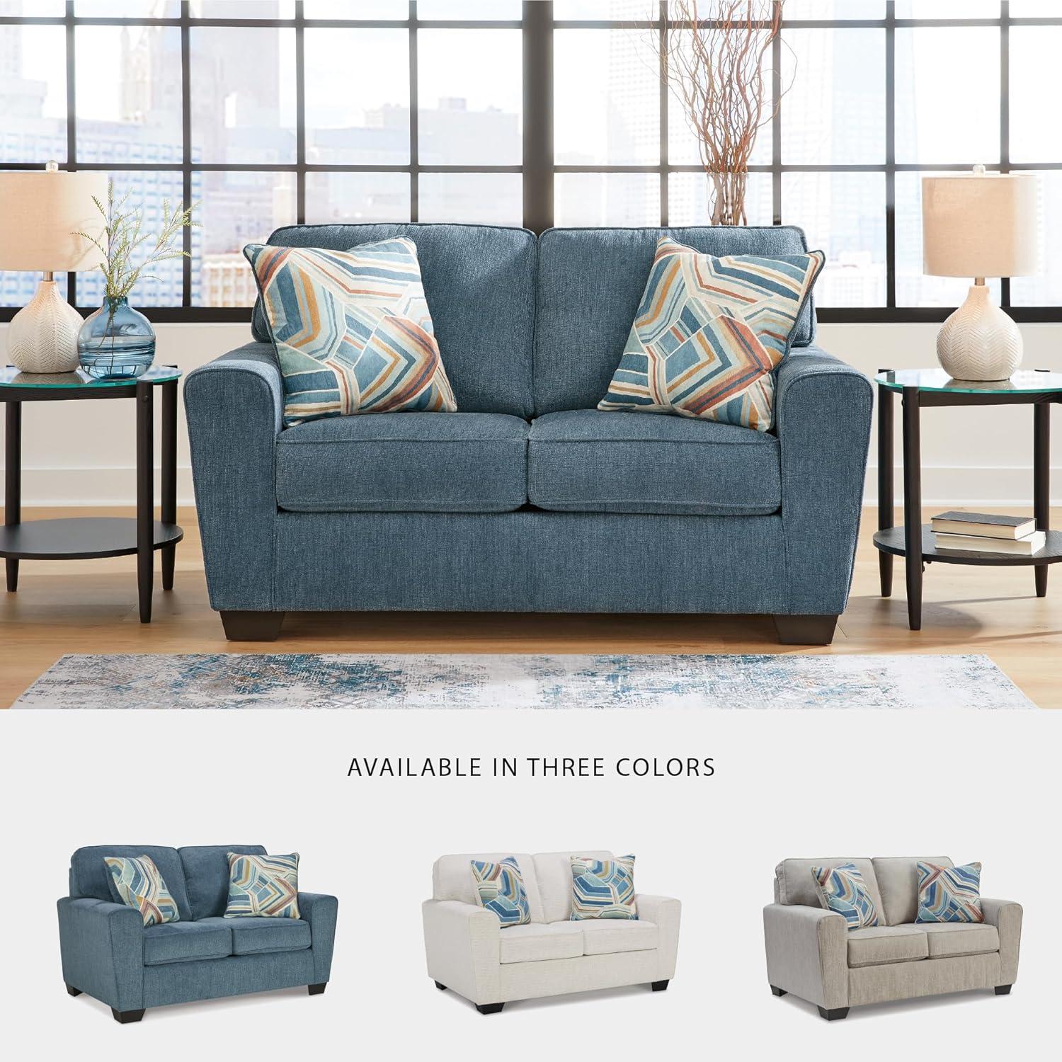 imageSignature Design by Ashley Cashton Contemporary Loveseat Exposed Feed With Faux Wood Finish Accent Pillows Fabric Upholstery 63quot W x 38quot D x 39quot H BlueBlue