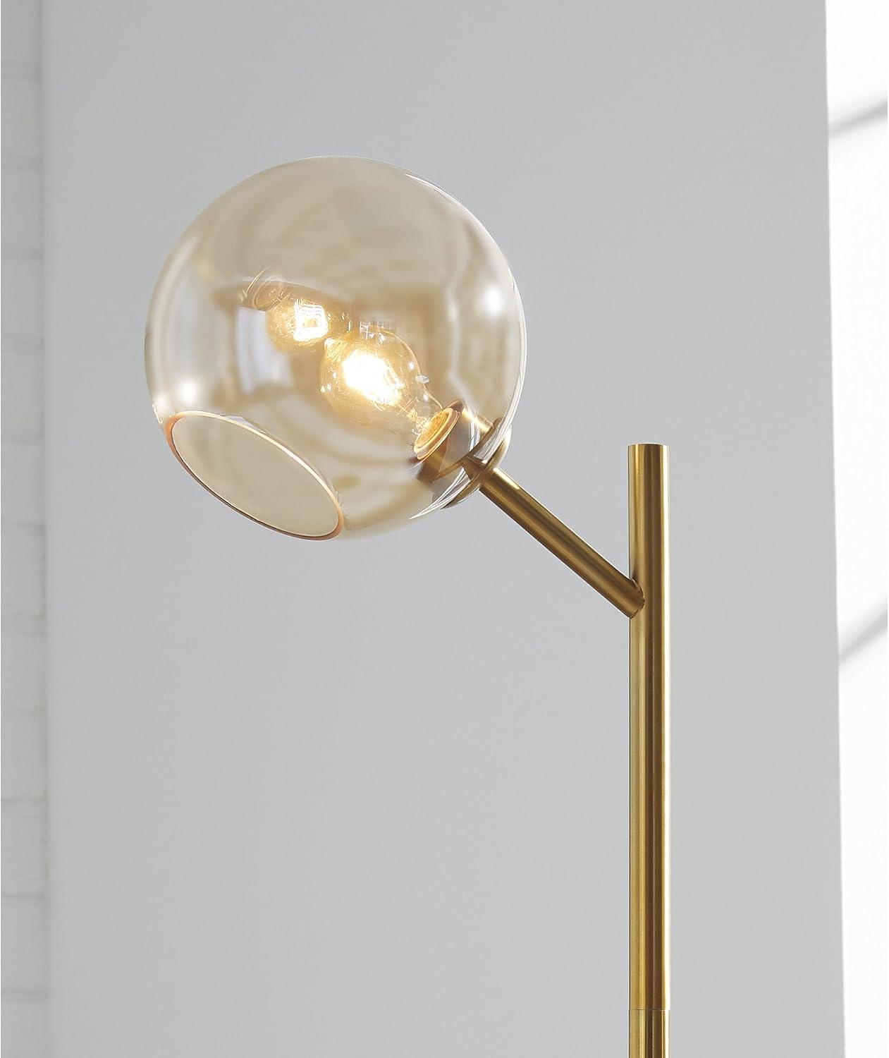 imageSignature Design by Ashley Abanson Contemporary 625quot Floor Lamp with Glass Shade and OnOff Foot Switch GoldGold