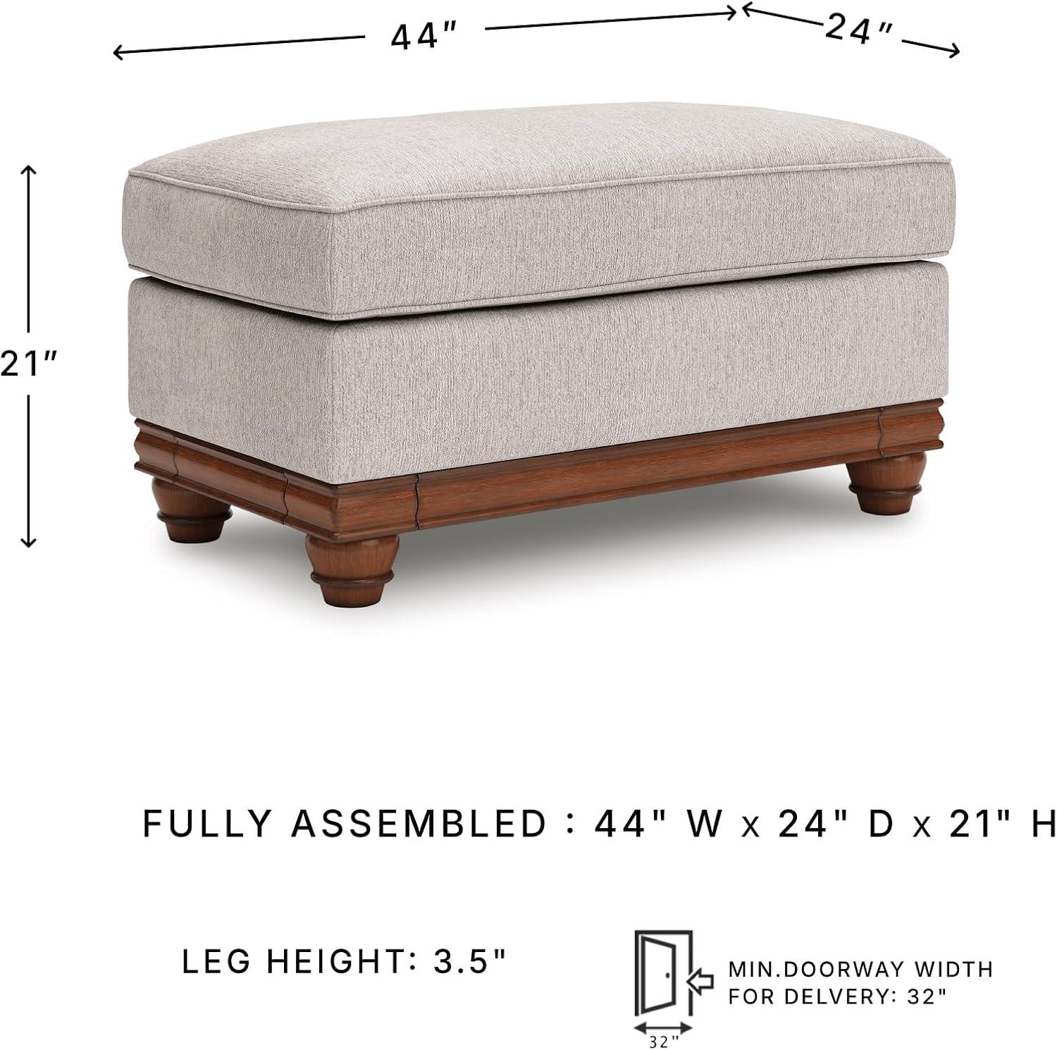 imageSignature Design by Ashley Meadowview Farmhouse Upholstered Ottoman with Turned Legs Light Gray