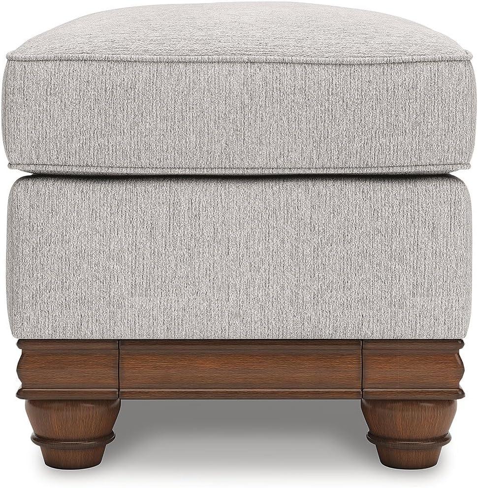 imageSignature Design by Ashley Meadowview Farmhouse Upholstered Ottoman with Turned Legs Light Gray