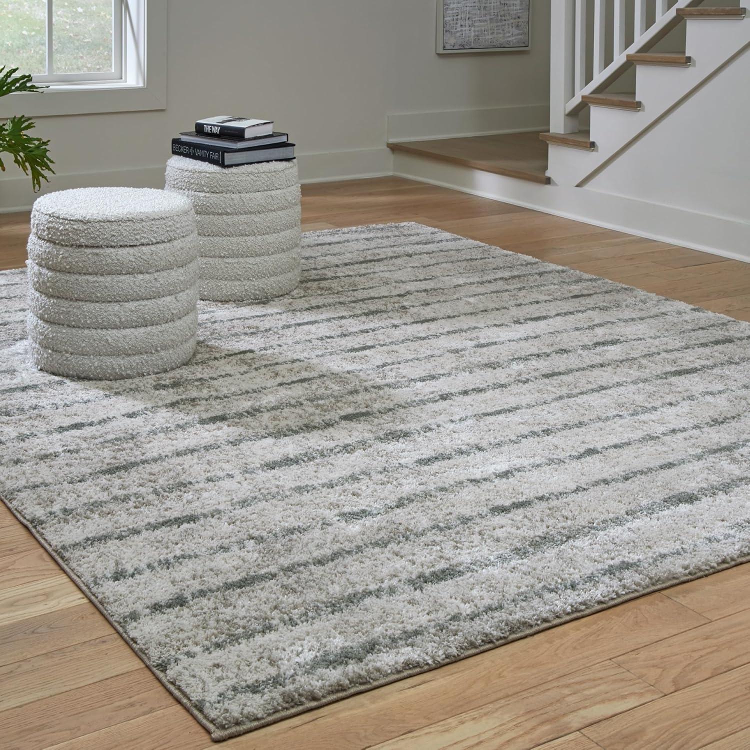 imageSignature Design by Ashley Laddway Casual Indoor Striped Fluffy 5 x 7 Rug Beige amp Gray710 x 99 Rectangular