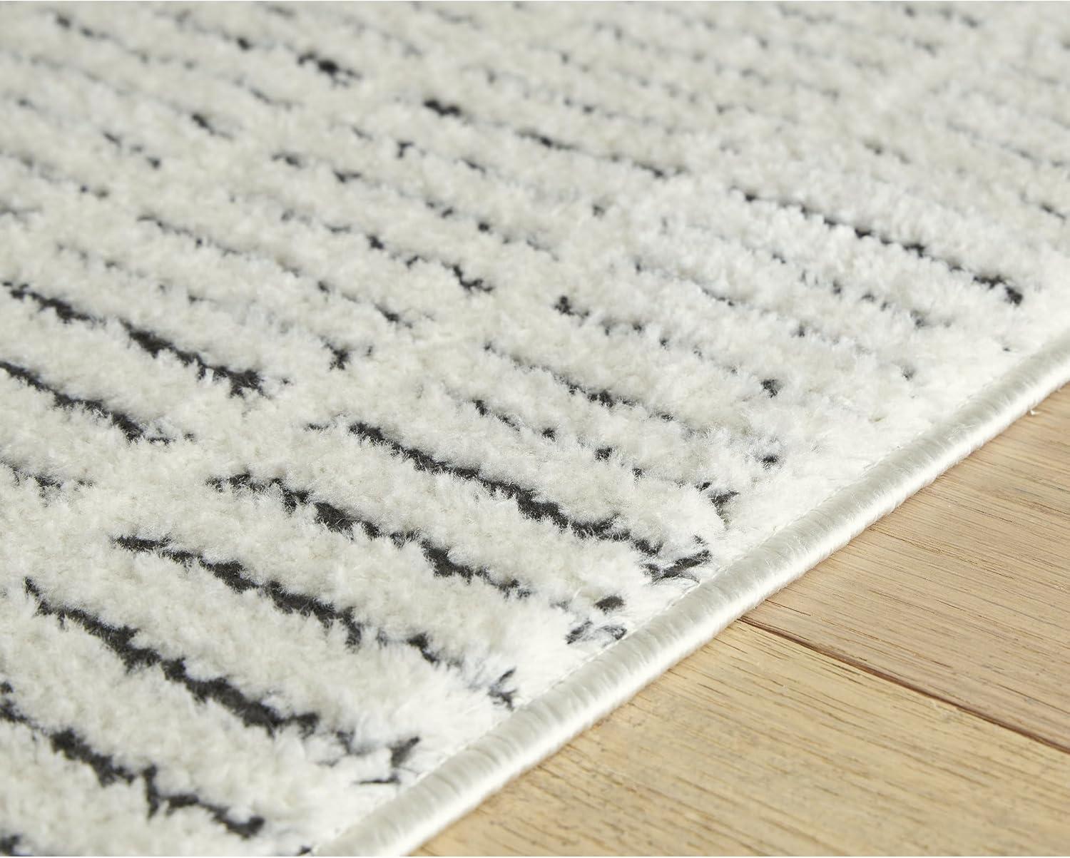 imageSignature Design by Ashley Turinwith Modern Indoor Striped Rectangular 5 x 7 Area Rug Beige amp Black53 x 7 Rectangular