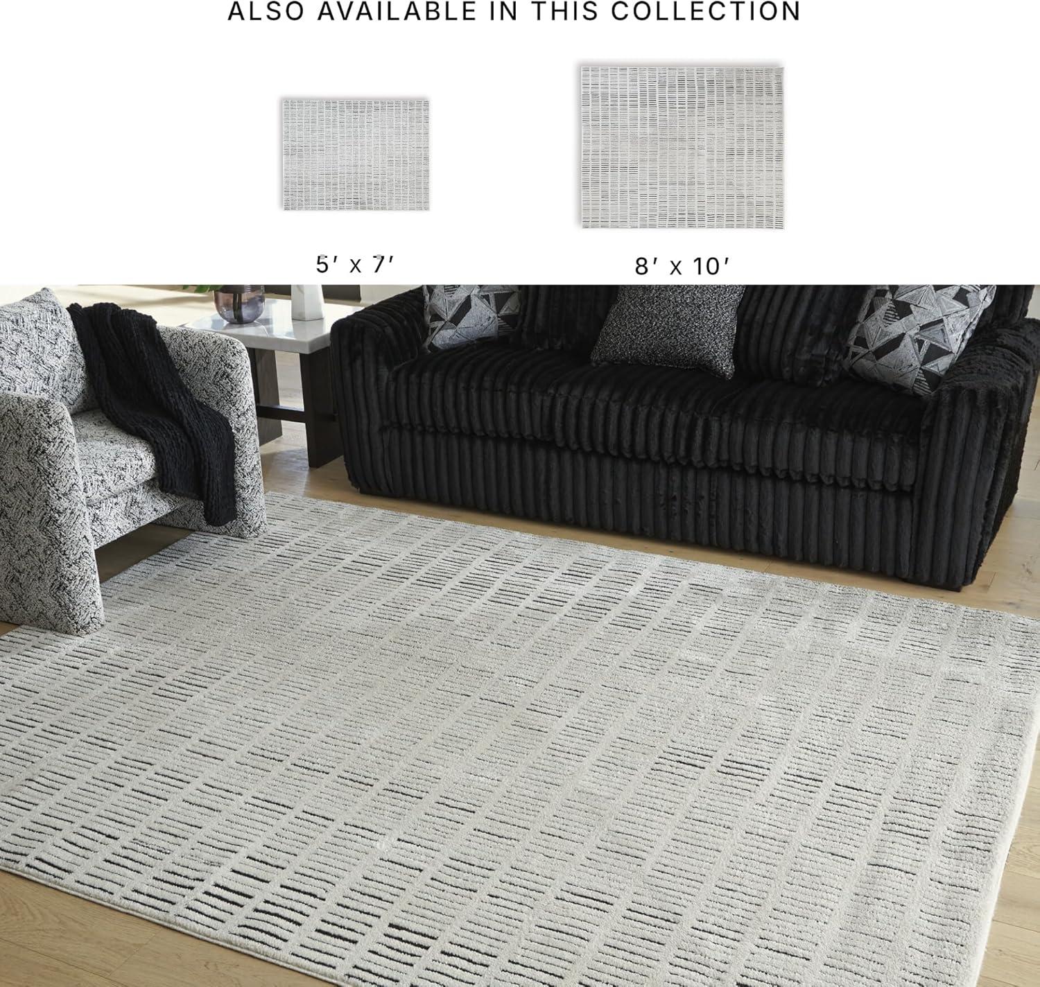 imageSignature Design by Ashley Turinwith Modern Indoor Striped Rectangular 5 x 7 Area Rug Beige amp Black711 x 911 Rectangular