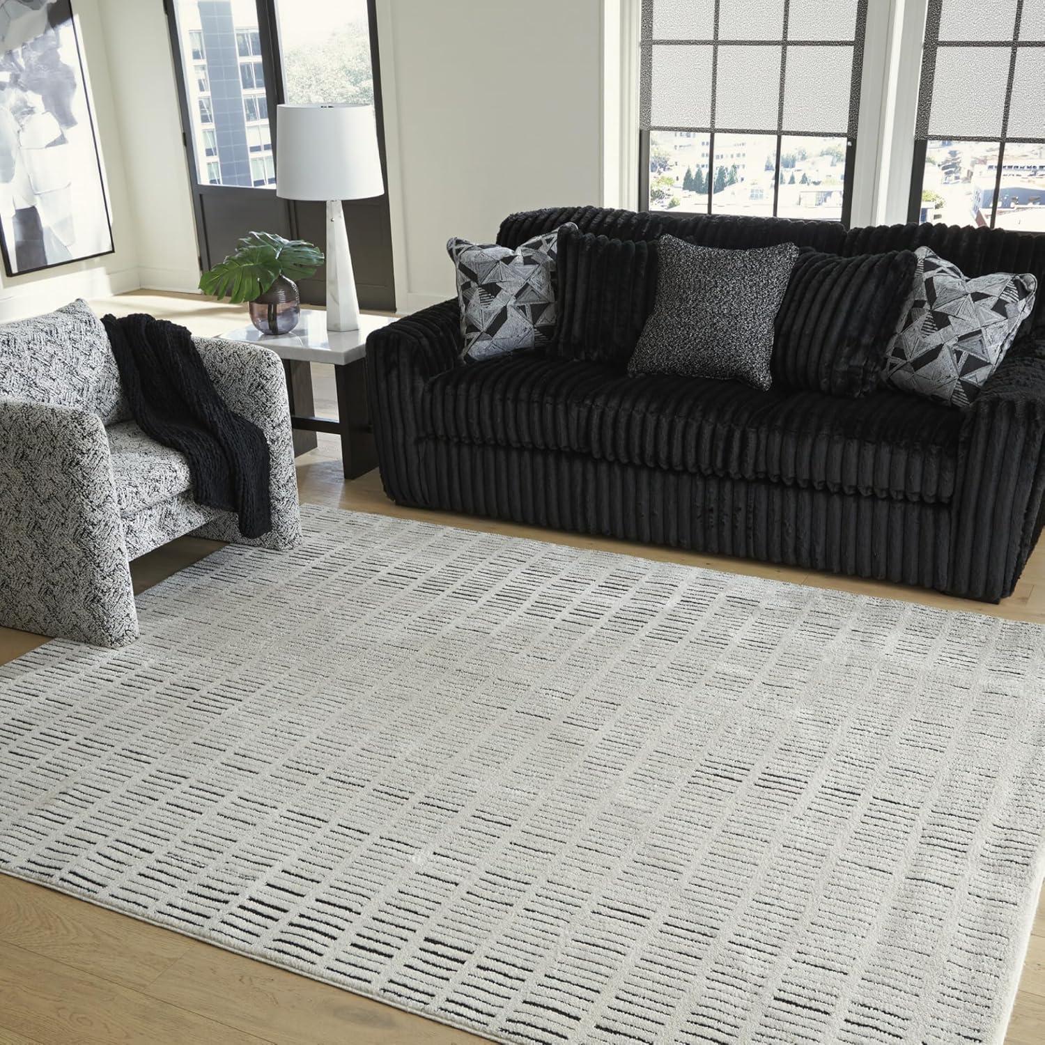 imageSignature Design by Ashley Turinwith Modern Indoor Striped Rectangular 5 x 7 Area Rug Beige amp Black711 x 911 Rectangular